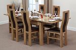 4ft 7" x 3ft Solid Oak Extending Dining Table + 6 Brown Curve Back Chairs