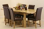 4ft 7" x 3ft Solid Oak Extending Dining Table + 6 Brown Leather Braced Scroll Back Chairs