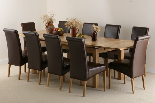 Solid oak Extending Dining Table 10 Brown Leather Chairs