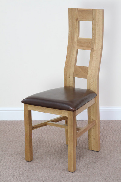http://www.awin1.com/awclick.php?awinmid=2152&awinaffid=71703&p=http://www.oakfurnitureland.co.uk/furniture/wave-back-solid-oak-and-brown-leather-dining-chair/1065.html Wave Back Solid Oak and Brown Leather Dining Chair