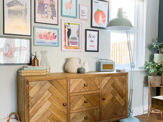 Oak Furnitureland Parquet sideboard with a colourful gallery wall above.