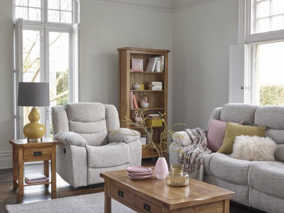 Grey recliner sofa and armchair paired with Original Rustic coffee table, side table and bookcase.