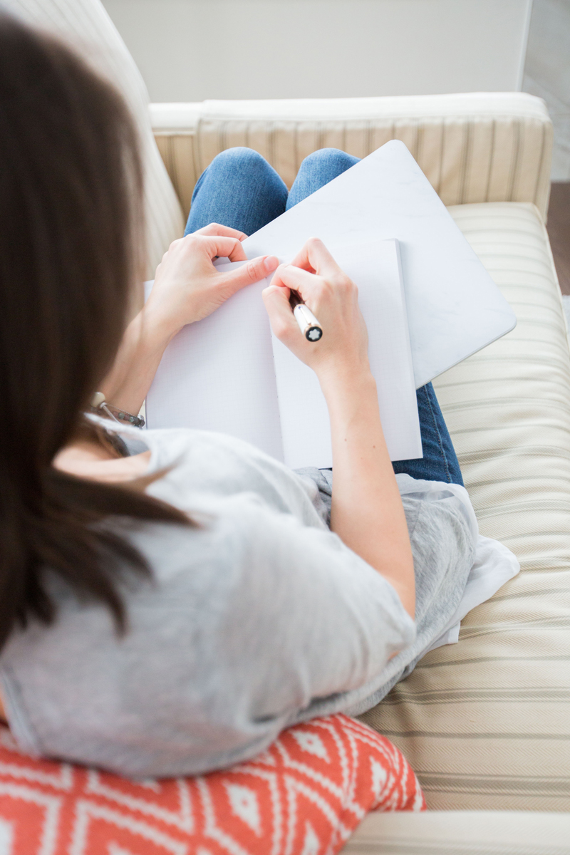 Woman Writing in her journal