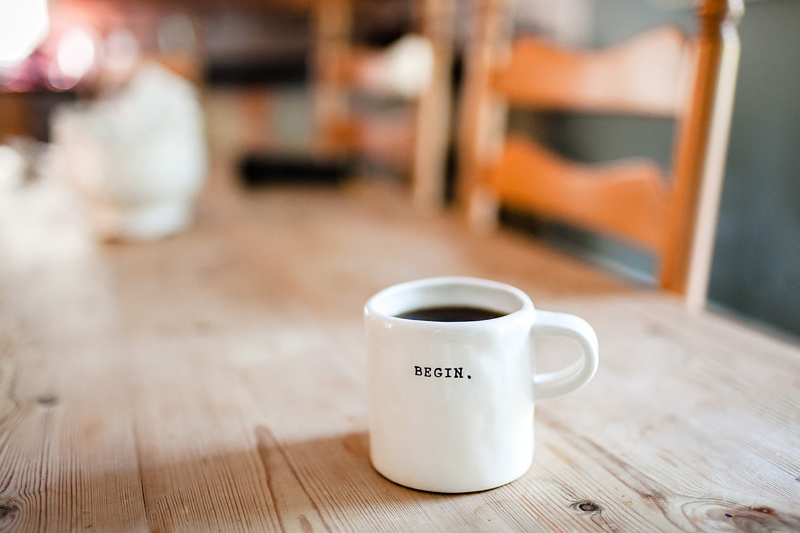 Mug of Coffee with Begin typography