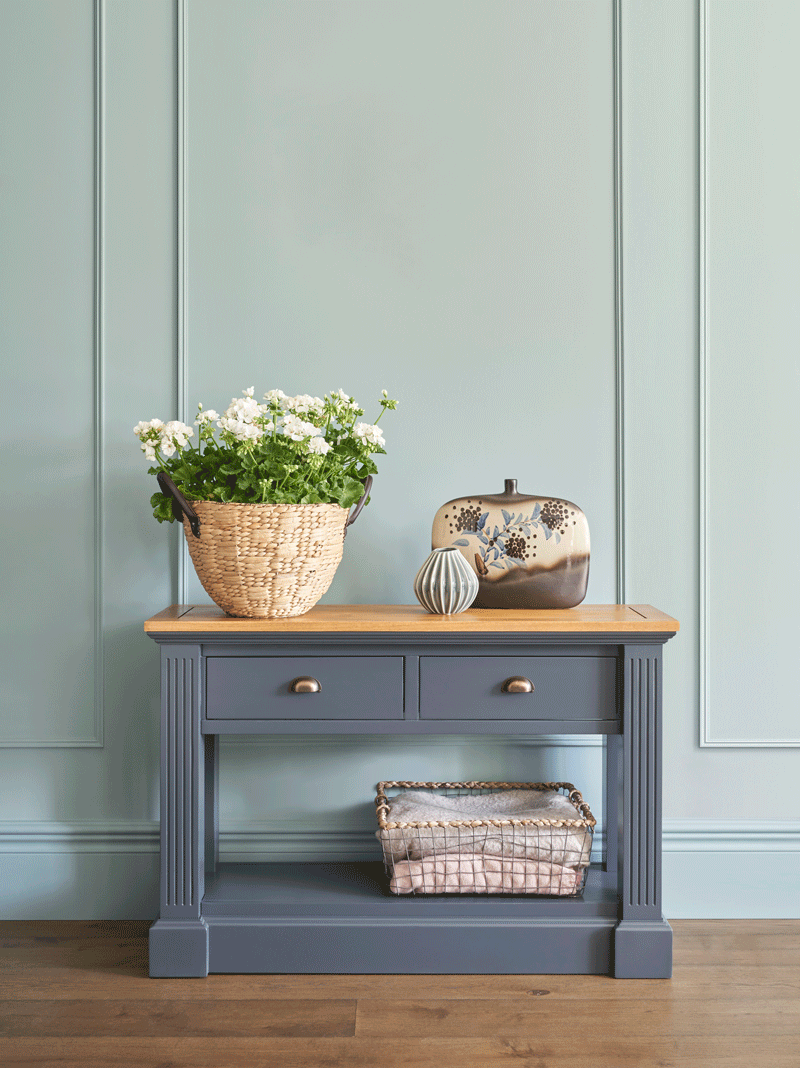 blue painted console table with brass handles