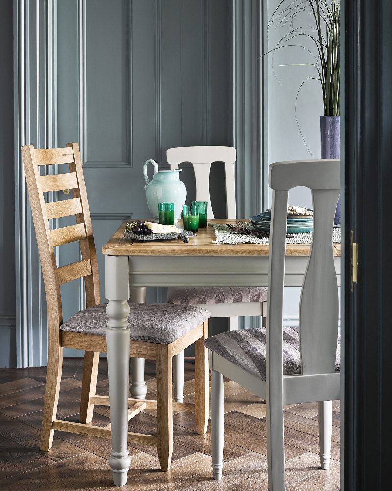 sage green painted dining set in blue toned dining room