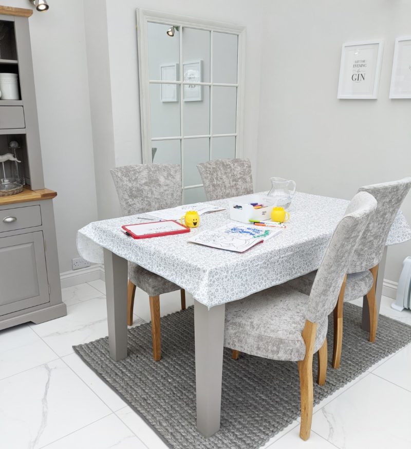 Home schooling on grey dining table