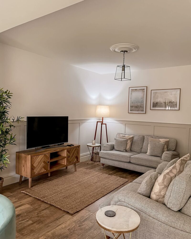 Grey living room featuring Oak Furnitureland Parquet TV unit.