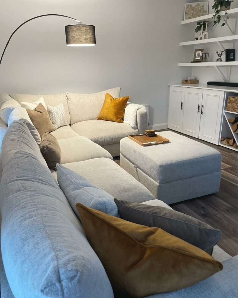 Oak Furnitureland grey Malvern corner sofa in white living room.