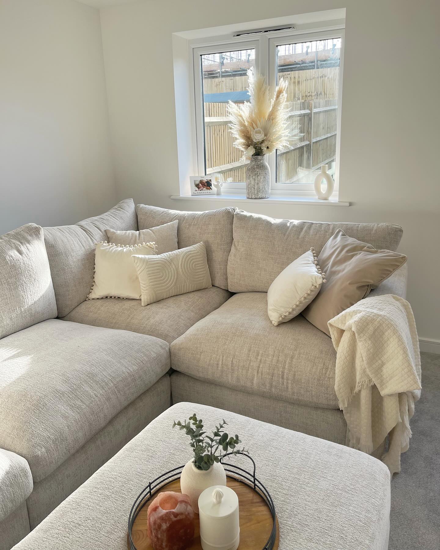 A sofa and footstool-living room-beige corner sofa