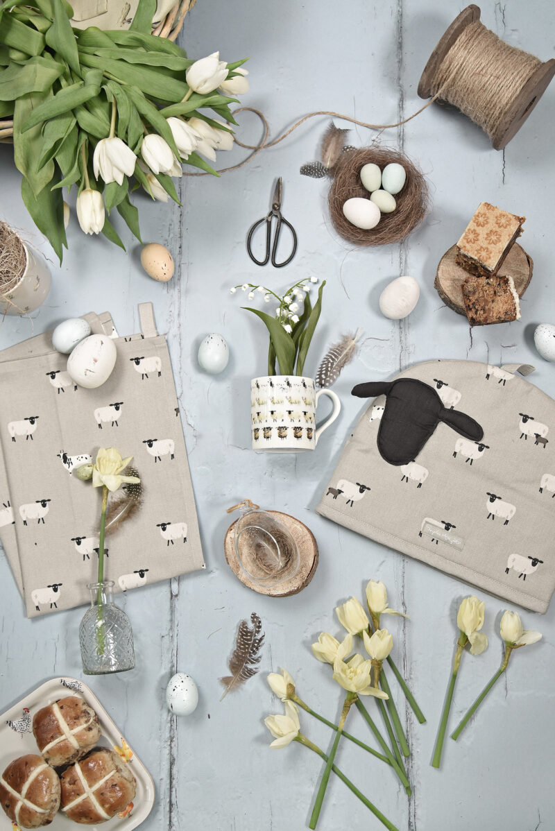 Easter decor with Sophie Allport sheep tea towel & tea cosy, styled with tulips & hot cross buns.