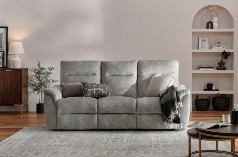 Oak Furnitureland Aldo 3-seater grey recliner sofa in modern neutral living room.