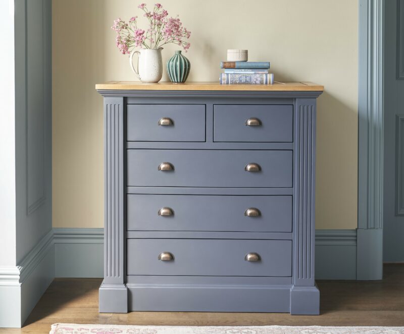 Oak Furnitureland inky blue painted Highgate 5-drawer chest.
