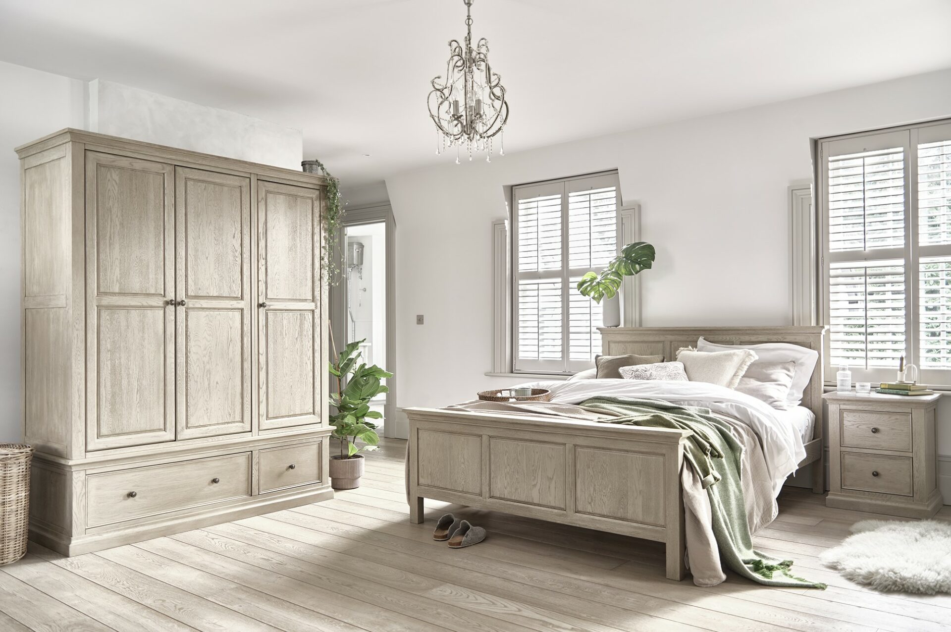 Oak Furnitureland Burleigh weathered oak bedroom furniture in a calm bedroom scheme with neutral styling.