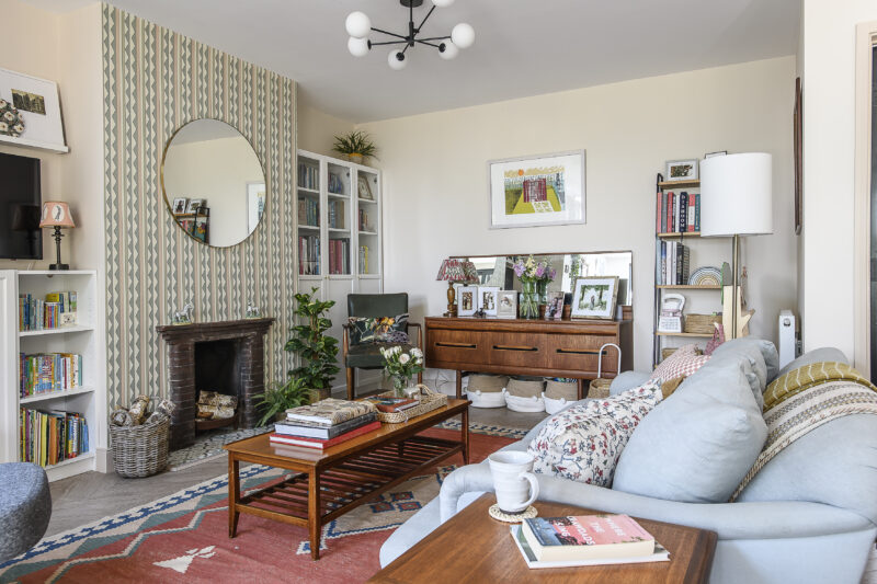 Eclectic dining room with a corner featuring children's toys.