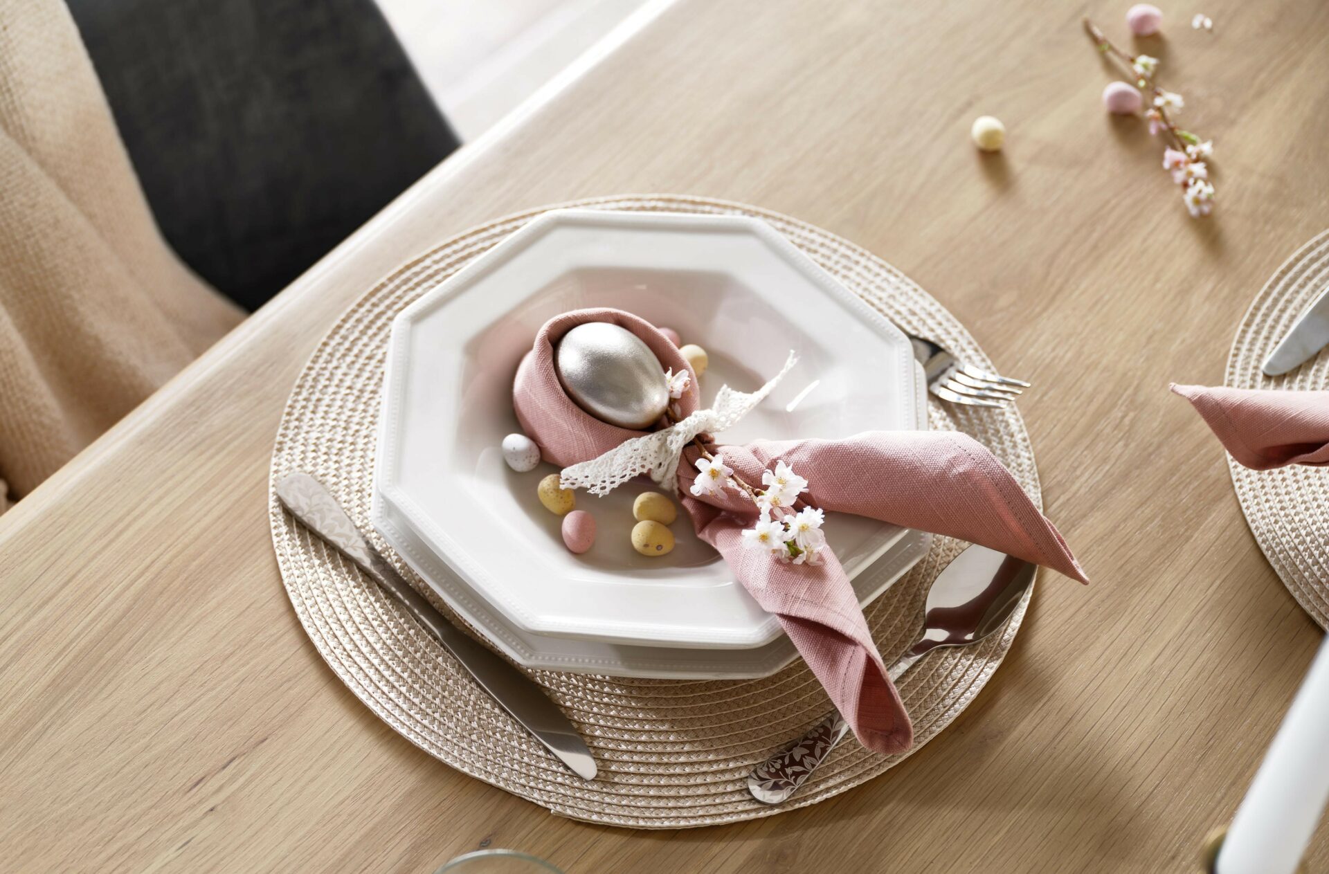 A dining table with place setting-dining furniture-wooden dining table with Easter tablescape place setting