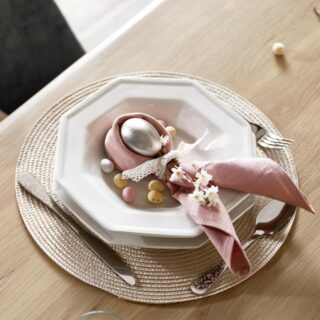 A dining table with place setting-dining furniture-wooden dining table with Easter tablescape place setting