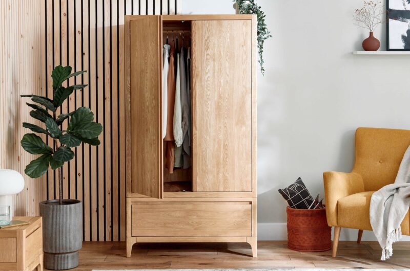 A wardrobe and chair-bedroom furniture-wooden double wardrobe with upholstered mustard armchair