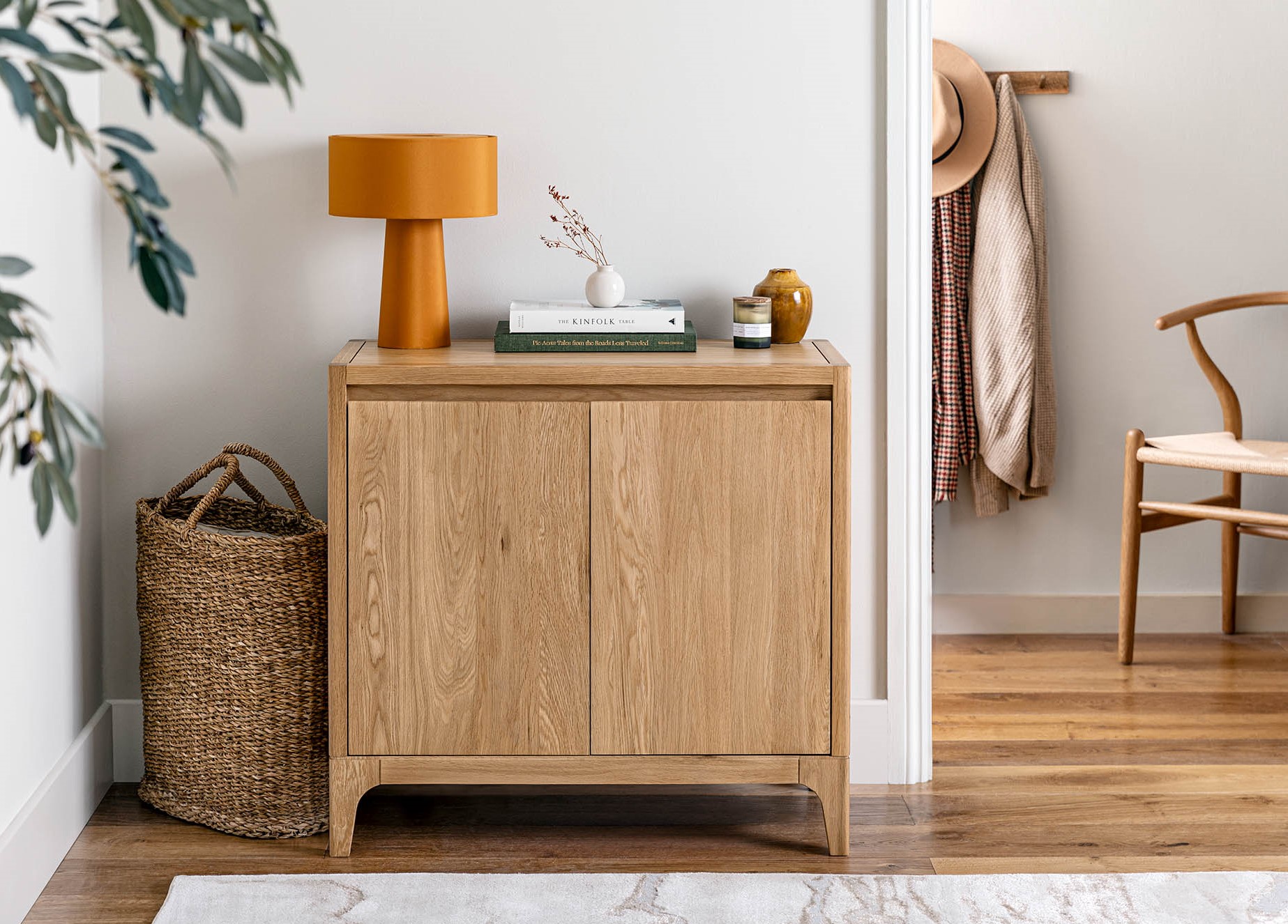 A sideboard-hallway furniture-small wooden sideboard-mustard lamp-wooden chair-coat hooks